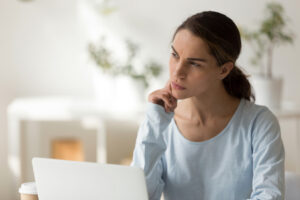 Pensive professional woman for big decision do more than think