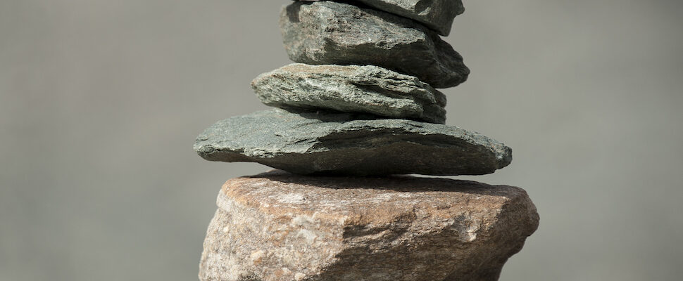 Stacked stones for get grounded to anchor and expand your potential