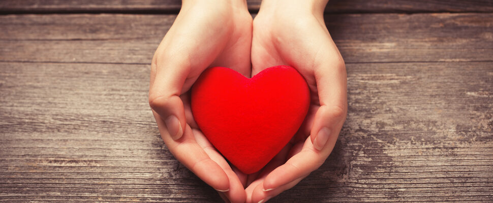 Heart in the hands for sending distance reiki healing to others or a troubled relationship