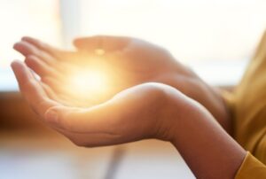 Hands with light for energy healer