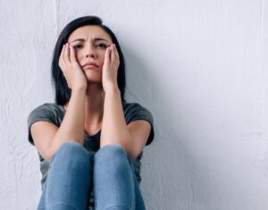 Distressed young woman for negative self-talk